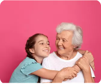 Girl hugging older woman